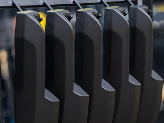 Close up of powder coated parts on an assembly line